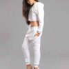 White cotton girls' sweatsuit. Soft, looped interior. Ribbed cuffs & hem. Comfortable fit, visible stitching detail. Sporty &
