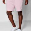 Close-up of breathable training shorts. Lightweight, textured fabric. Reinforced stitching for durability. Ideal for active w