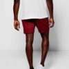 Close-up of breathable training shorts. Lightweight, textured fabric. Reinforced stitching for durability. Ideal for active w