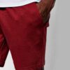 Close-up of breathable training shorts. Lightweight, textured fabric. Reinforced stitching for durability. Ideal for active w