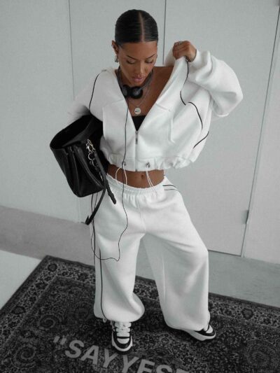 Ladies' two-piece sweat set: Soft, slightly heathered knit. Ribbed cuffs & hem. Note the clean, even stitching. Comfortable a