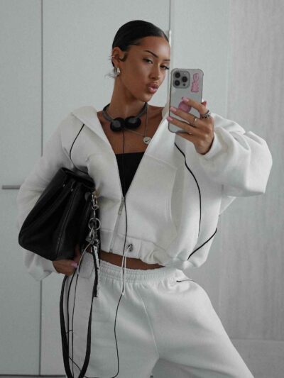 Ladies' two-piece sweat set: Soft, slightly heathered knit. Ribbed cuffs & hem. Note the clean, even stitching. Comfortable a