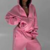 Ladies' two-piece sweat set: Soft, slightly heathered knit. Ribbed cuffs & hem. Note the clean, even stitching. Comfortable a