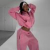 Ladies' two-piece sweat set: Soft, slightly heathered knit. Ribbed cuffs & hem. Note the clean, even stitching. Comfortable a