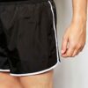 Quick-dry beach shorts: vibrant print, polyester weave detail, sturdy seams. Men's swimwear, customizable with logo. Light bl