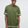 Close-up of custom printed shirts. Soft knit fabric, vibrant design. Notice the clean stitching on the short sleeves. A hint