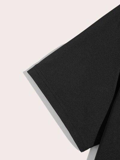 Close-up of a well-stitched, comfortable t-shirt. Soft cotton blend, smooth texture, excellent drape. Crew neck, short sleeve