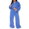 Women's tracksuit set: hooded zip jacket and jogger pants. Soft, textured fabric, clean stitching. Subtle color variations vi