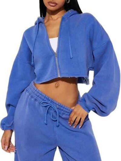 Women's tracksuit set: hooded zip jacket and jogger pants. Soft, textured fabric, clean stitching. Subtle color variations vi