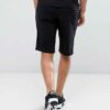 Summer jogger shorts in a light, breathable fabric. Note the elastic waistband, drawstring, and clean stitching. Perfect for