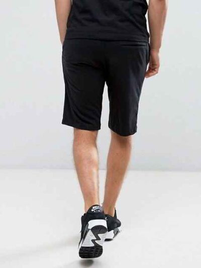 Summer jogger shorts in a light, breathable fabric. Note the elastic waistband, drawstring, and clean stitching. Perfect for