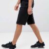 Summer jogger shorts in a light, breathable fabric. Note the elastic waistband, drawstring, and clean stitching. Perfect for