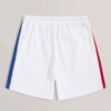 Close-up elastic waist workout shorts, subtle textured fabric, neat stitching detail. Garment type: women's running shorts. C