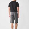 Men's cotton short set, embroidered logo detail. Casual two-piece outfit. Soft, textured fabric. Visible quality stitching. R