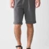 Men's cotton short set, embroidered logo detail. Casual two-piece outfit. Soft, textured fabric. Visible quality stitching. R