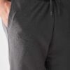 Men's cotton short set, embroidered logo detail. Casual two-piece outfit. Soft, textured fabric. Visible quality stitching. R