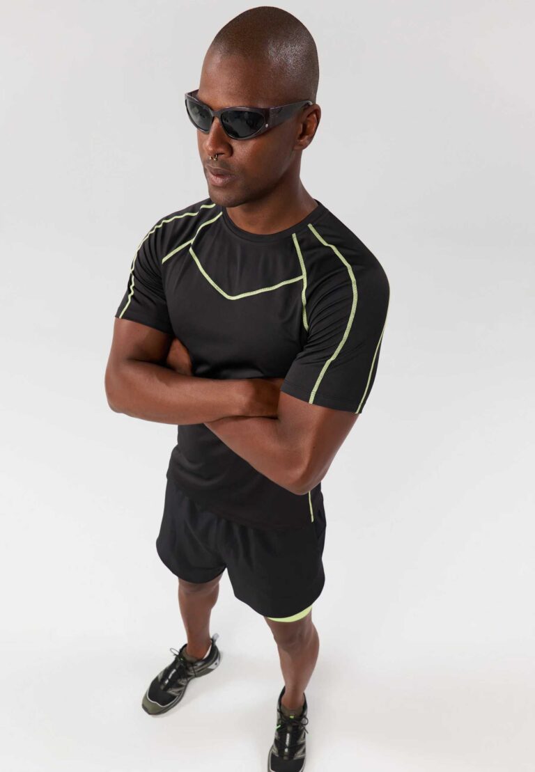 Men's gym workout set: T-shirt and shorts. Moisture-wicking knit fabric, athletic fit, reinforced stitching. Great for active