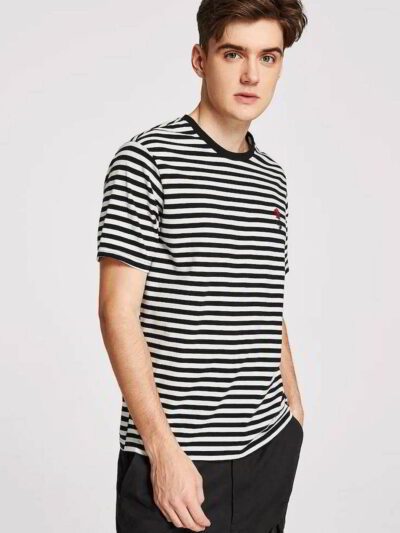 Close-up of a substantial, dark grey t-shirt. Notice the dense knit, reinforcing stitching around the collar and sleeves, hin