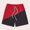 Light blue running shorts, quick-dry fabric texture, secure zipper pockets. Lightweight athletic wear with fine stitching det