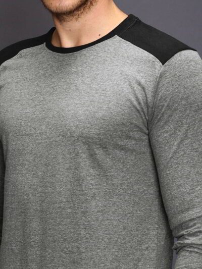 Heathered grey long sleeve t-shirt, soft texture, clean stitching. Classic crew neck style, ideal for layering. Unisex fit. -