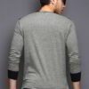 Heathered grey long sleeve t-shirt, soft texture, clean stitching. Classic crew neck style, ideal for layering. Unisex fit. -