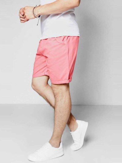 Close-up of vibrant running shorts. High-stretch spandex, fine stitching details. Athletic apparel in bright hues, ideal for
