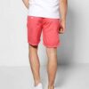 Close-up of vibrant running shorts. High-stretch spandex, fine stitching details. Athletic apparel in bright hues, ideal for