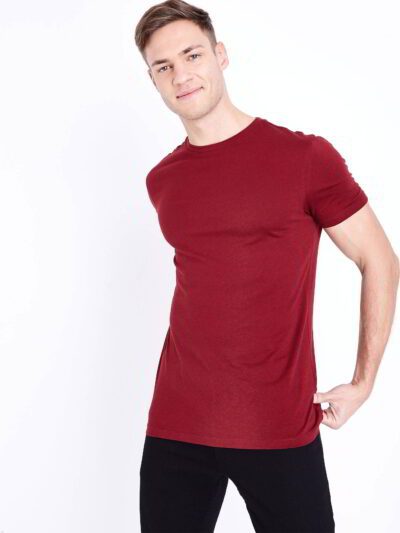 Soft organic cotton tees with clean stitching. See the slight texture and the rich, solid coloring. Sustainable everyday wear