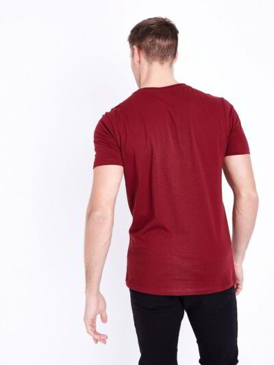 Soft organic cotton tees with clean stitching. See the slight texture and the rich, solid coloring. Sustainable everyday wear