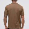 Close-up of a textured polo shirt. Fine pique knit, reinforced stitching, vibrant color hints. Customizable with your logo. -