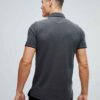 Close-up polo shirt. High-quality knit fabric, detailed embroidery. Navy blue & white, textured look. Short-sleeved, premium