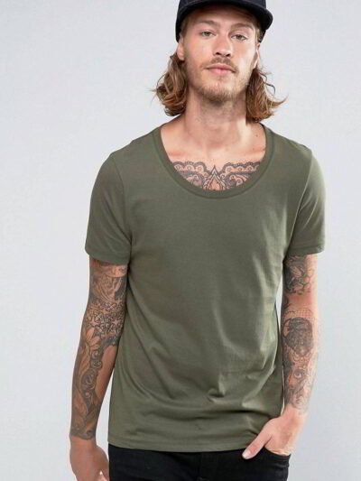Close-up: Printed cotton t-shirt, breathable knit. Detailed stitching, vibrant design. Soft, comfortable wholesale tees in bu