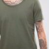 Close-up: Printed cotton t-shirt, breathable knit. Detailed stitching, vibrant design. Soft, comfortable wholesale tees in bu