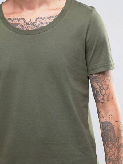 Close-up: Printed cotton t-shirt, breathable knit. Detailed stitching, vibrant design. Soft, comfortable wholesale tees in bu