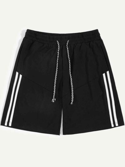 Close-up of athletic shorts. Breathable knit fabric, strong stitching, vibrant color. Ideal gym or team wear. Moisture-wickin