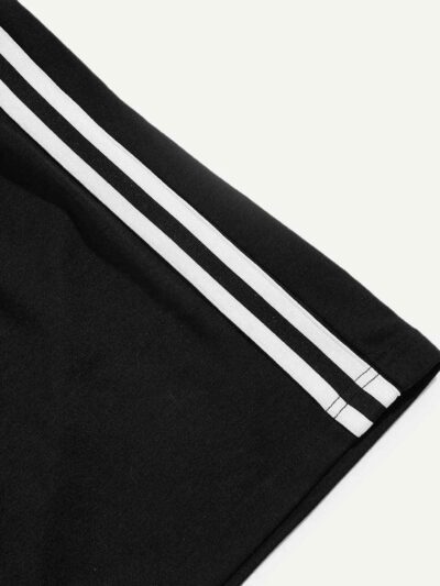 Close-up of athletic shorts. Breathable knit fabric, strong stitching, vibrant color. Ideal gym or team wear. Moisture-wickin