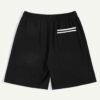 Close-up of athletic shorts. Breathable knit fabric, strong stitching, vibrant color. Ideal gym or team wear. Moisture-wickin