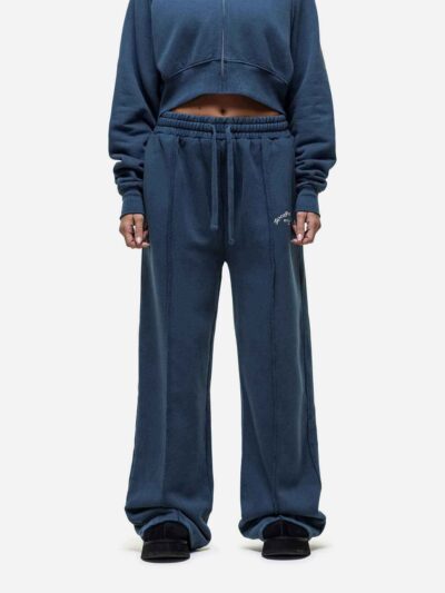 Women's running tracksuit set. Peach-toned heathered fabric, flatlock seams, fitted silhouette. Activewear for gym or outdoor