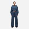 Women's running tracksuit set. Peach-toned heathered fabric, flatlock seams, fitted silhouette. Activewear for gym or outdoor