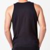 Close-up of a smooth, stretchy, seamless singlet. Neutral color, fine knit texture. Shows the comfortable, tagless neckline a