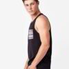 Close-up of a smooth, stretchy, seamless singlet. Neutral color, fine knit texture. Shows the comfortable, tagless neckline a