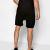 Close-up of premium training shorts: smooth, solid color fabric, reinforced stitching. Athletic wear for intense workouts. -