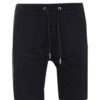 Close-up of premium training shorts: smooth, solid color fabric, reinforced stitching. Athletic wear for intense workouts. -