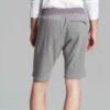 Vibrant summer sports shorts with sublimated print. Close-up reveals breathable, lightweight knit. Clean stitching. Perfect f