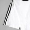 Distressed vintage style t-shirts. Soft, slightly faded cotton jersey. Double-stitched seams, classic crew neck. Hints of hea