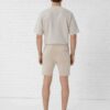 Vintage washed men's oversized t-shirt and shorts set. Textured fabric, relaxed fit, subtle seam detailing. Perfect casual st