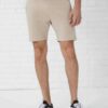 Vintage washed men's oversized t-shirt and shorts set. Textured fabric, relaxed fit, subtle seam detailing. Perfect casual st