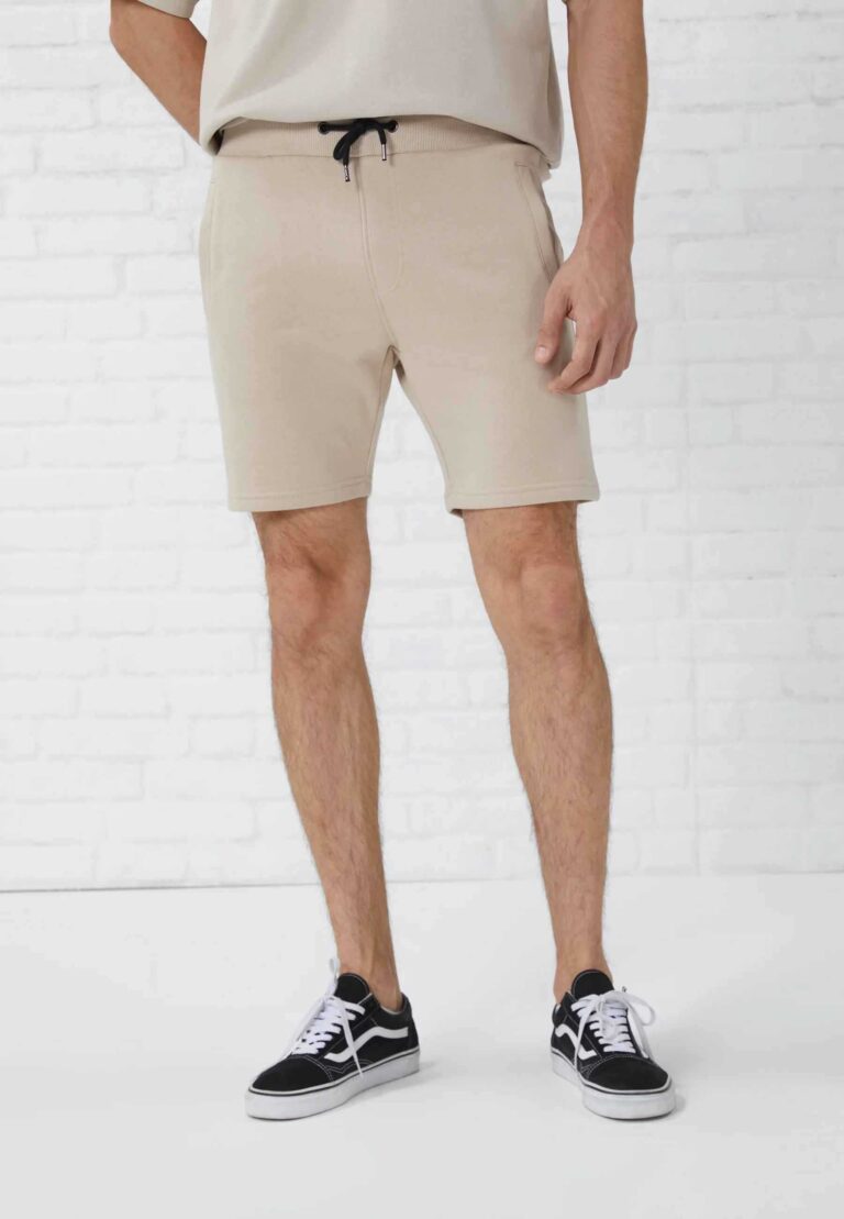 Vintage washed men's oversized t-shirt and shorts set. Textured fabric, relaxed fit, subtle seam detailing. Perfect casual st