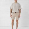 Vintage washed men's oversized t-shirt and shorts set. Textured fabric, relaxed fit, subtle seam detailing. Perfect casual st