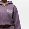 Knit women's tracksuit set. Fleece joggers, custom logo on sweatshirt. Soft, textured knit, quality stitching. Comfortable an